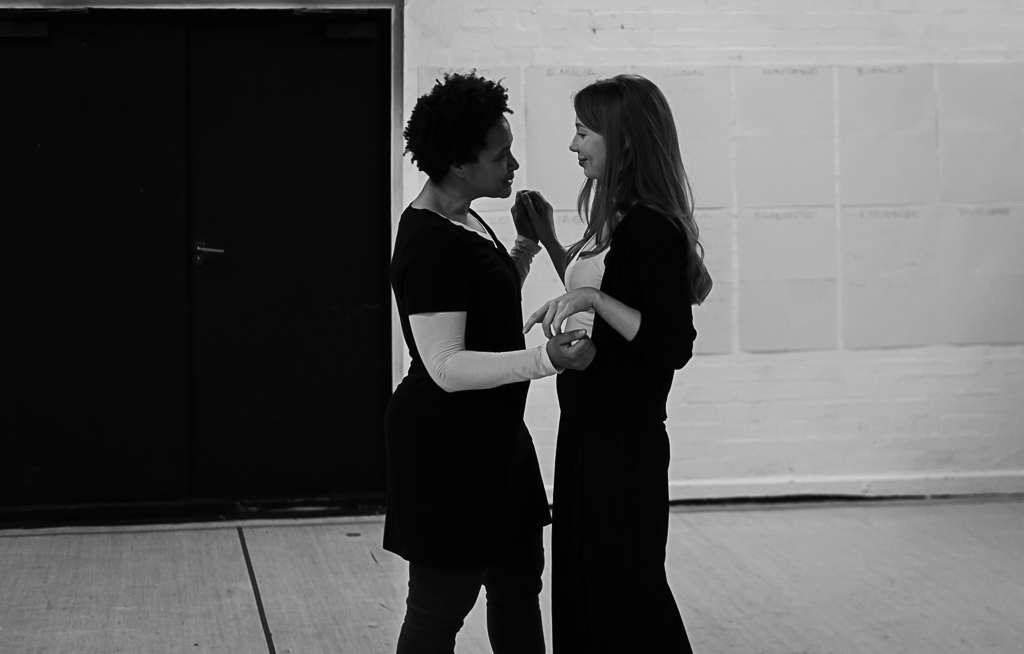Golda Rosheuvel as Othello & Emily Hughes as Desdemona. Othello in rehearsal. Photograph by Brian Roberts
