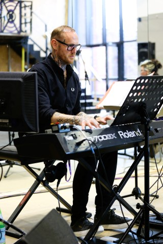 Musical Director Bob Broad in rehearsals for Alice in Wonderland
