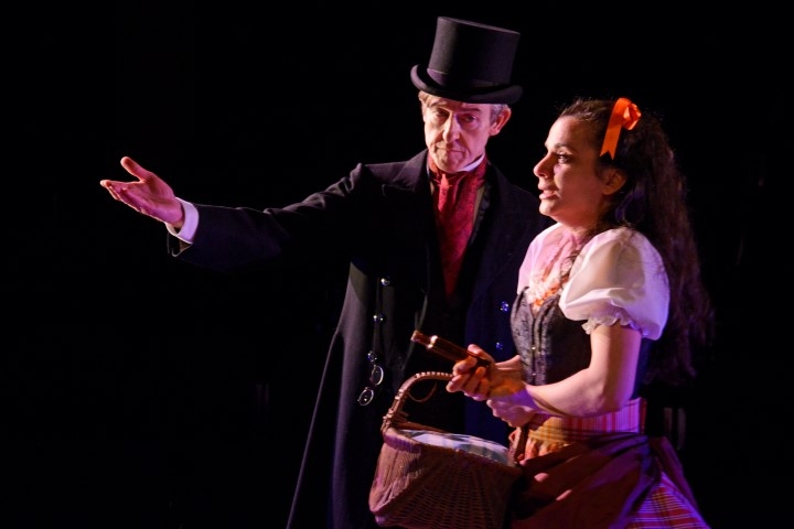 Andrew Price as Thomas Gradgrind and Suzanne Ahmet as Sissy Jupe in Hard Times. Photograph by Nobby Clark.