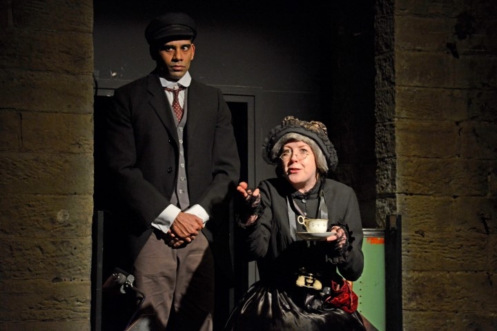 Darren Kuppan as Bitzer and Victioria Brazier as Mrs Sparsit in Hard Times. Photograph by Nobby Clark.