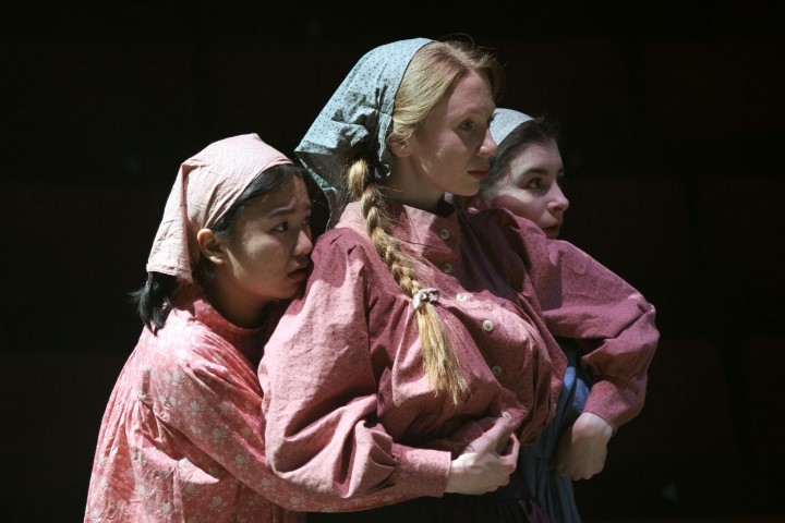 Nadia Mohamad Noor, Emily Hughes & Ellie Turner in Fiddler on the Roof. Photograph by Stephen Vaughan.