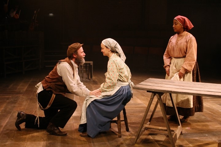 Patrick Brennan, Laura Dos Santos & Melanie La Barrie in Fiddler on the Roof. Photograph by Stephen Vaughan.