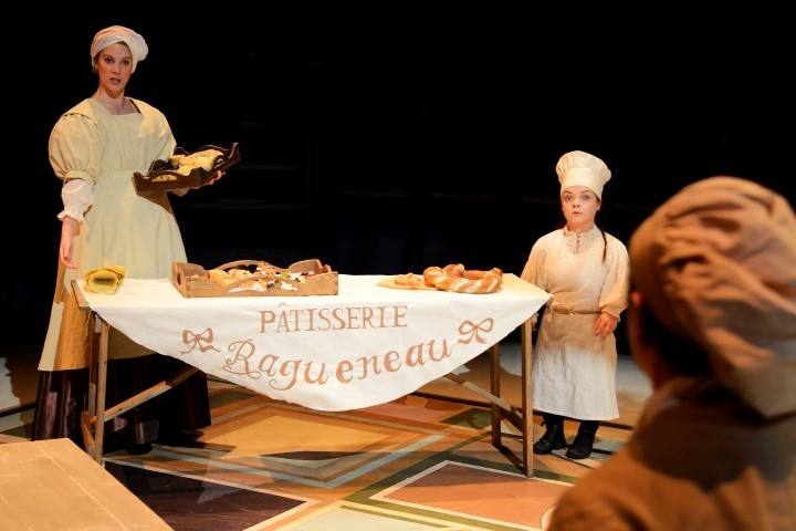 Jessica Dyas as Lise Ragueneau & Francesca Mills as Apprentice in Cyrano. Photograph by Nobby Clark.