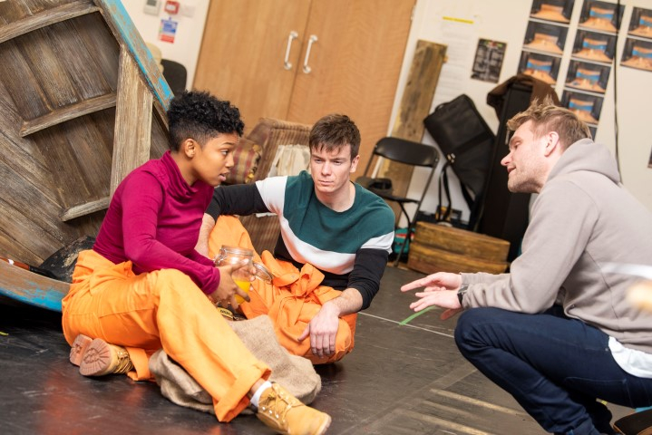 Leona Allen, James Backway and director Adam Penford in rehearsals for Holes by Tracey Whitefoot
