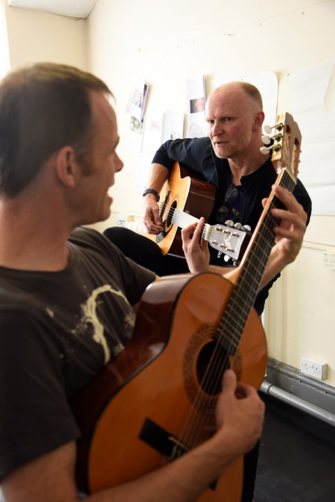 Michael Hugo and director Conrad Nelson in They Don't Pay? We Won't Pay! rehearsals. Photograph by Nobby Clark.