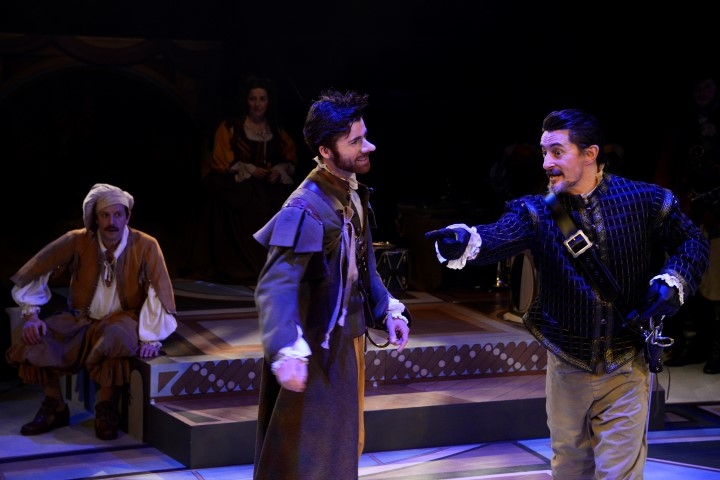 Paul Barnhill as Ragueneau with Christian Edwards as Cyrano & Anthony Hunt as Cavalryman in Cyrano. Photograph by Nobby Clark.