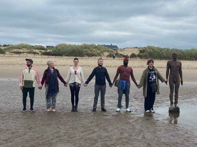 The cast and company of Our Lady of Blundellsands visit the Beach