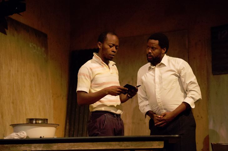 Tonderai Munyevu as Buntu and Sibusiso Mamba as Sizwe Banzi  in Sizwe Banzi is Dead. Photograph by Richard Hubert Smith.