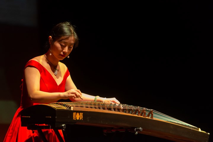 Xiao Xiao Hou performing on the Playhouse stage, photo by Brian Roberts