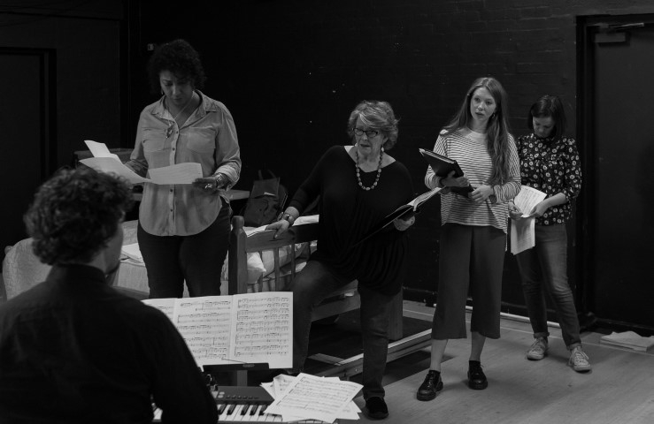 Musical Director Vidar Norheim, Melanie La Barrie, Pauline Daniels, Emily Hughes & Laura Dos Santos. The Sum in rehearsal. Photograph by Brian Roberts.